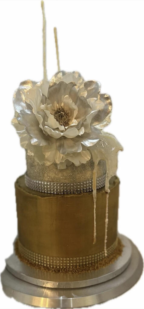 Elegant Gold Floral Cake Chocolate ganache-covered cake hand-painted with edible gold and topped with a large ivory silk flower.